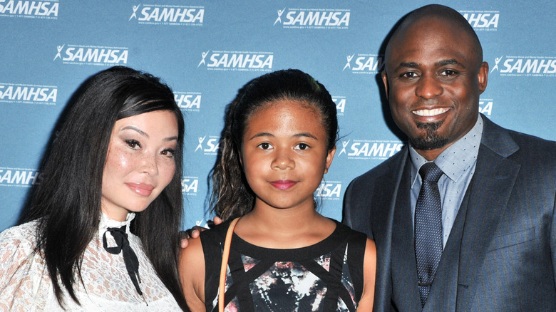 Wayne Brady posing with Mandie Taketa and Maile