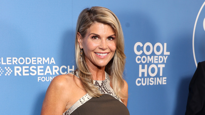 Lori Loughlin smiling at an event