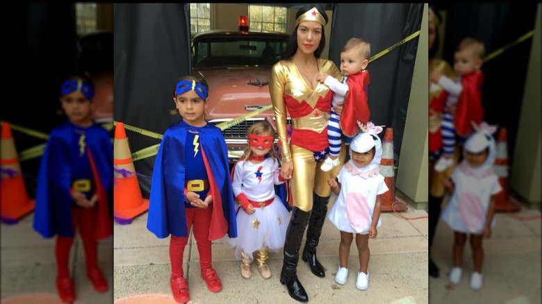 Kourtney Kardashian and kids in superhero costumes