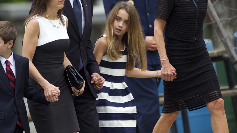 Natalie Biden wearing striped dress