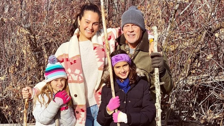 Emma Heming Willis, Bruce Willis, and their daughters posing