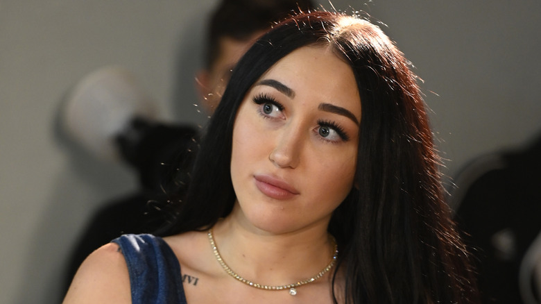 Noah Cyrus tilting her head