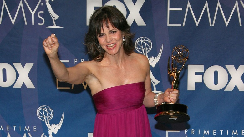 Sally Field cheering and holding an Emmy