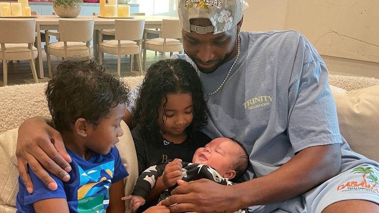 Tristan Thompson posing with kids