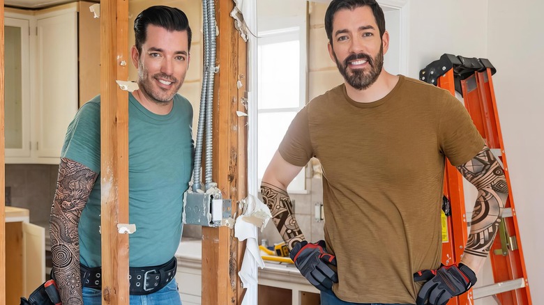 Jonathan and Drew Scott with tattoos