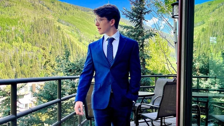 Tyler Sanders wearing suit