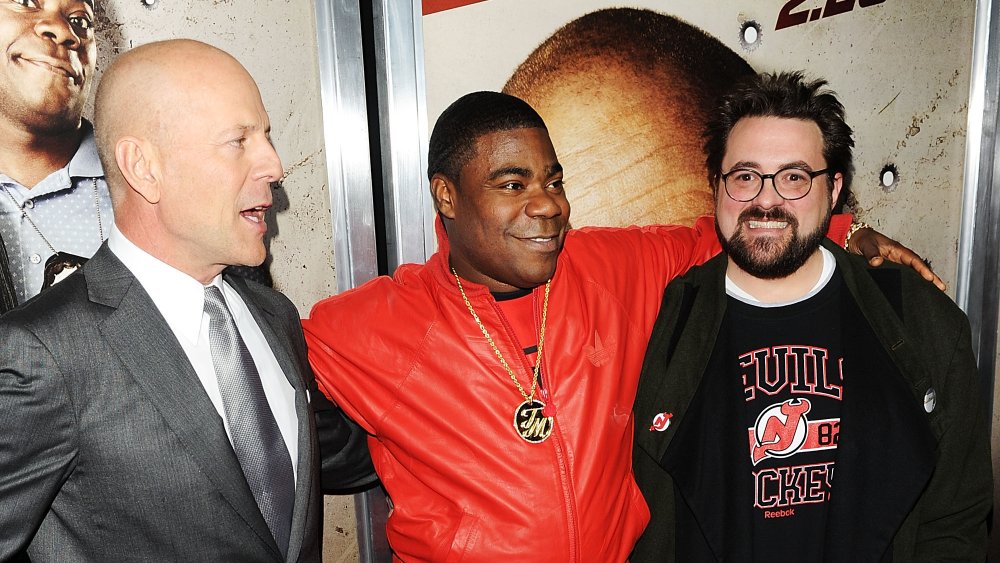 (L-R) Actor Bruce Willis, actor Tracy Morgan and director Kevin Smith attend the premiere of "Cop Out"