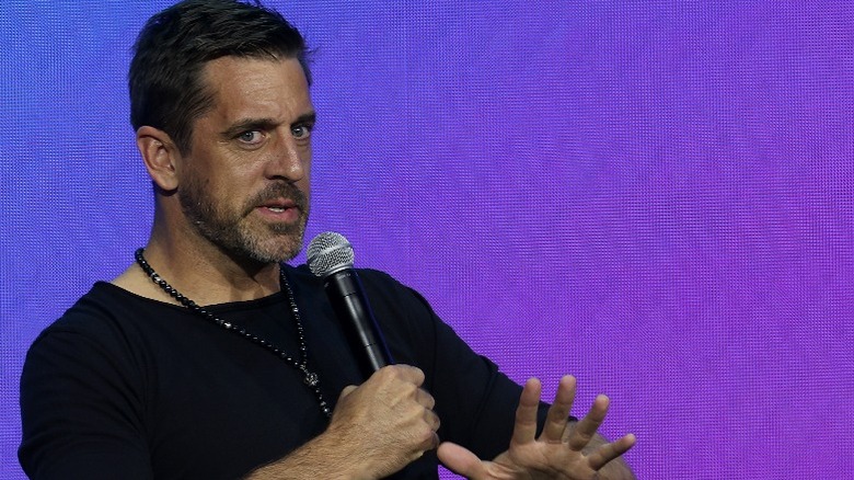 Aaron Rodgers on stage for a psychedelics conference in Denver (2023)