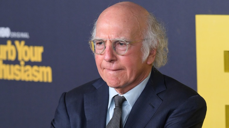 Larry David navy blue suit