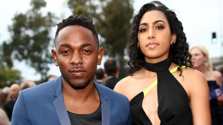 Kendrick Lamar, posing with Whitney Alford