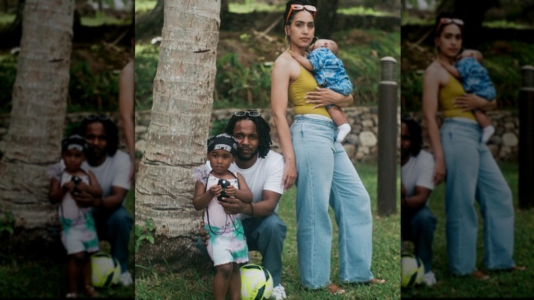 Kendrick Lamar, posing with Whitney Alford and their kids