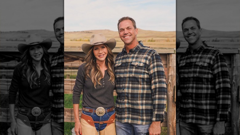 Kristi Noem in cowboy outfit with Bryon Noem on ranch