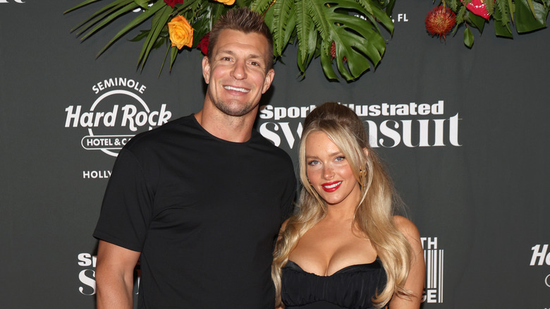 Rob Gronkowski, Camille Kostek posing