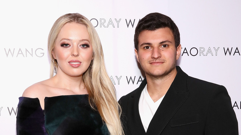 Tiffany Trump and Michael Boulos pose