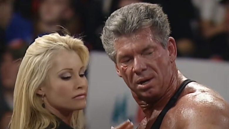 Sable touching Vince McMahon