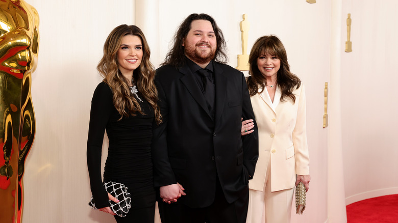 Wolfgang Van Halen with wife and mom on Oscars red carpet