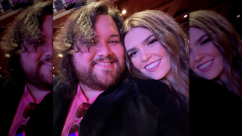 Wolfgang Van Halen and Andraia Allsop taking a selfie at the "Barbie" premiere