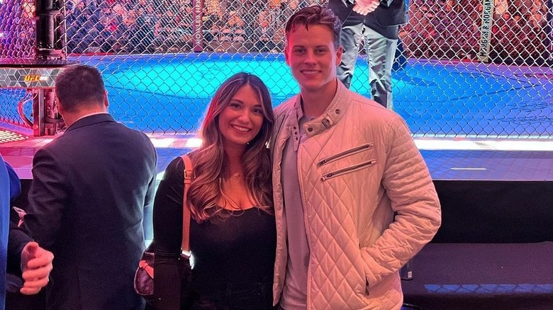 Joe Burrow and Olivia Holzmacher smiling