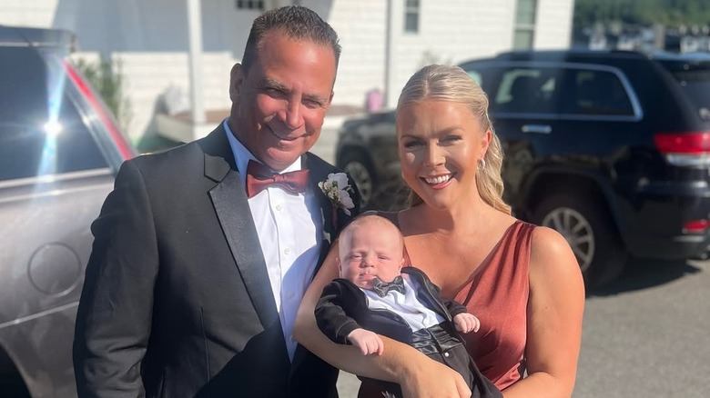 Karoline Leavitt, posing with her husband and son