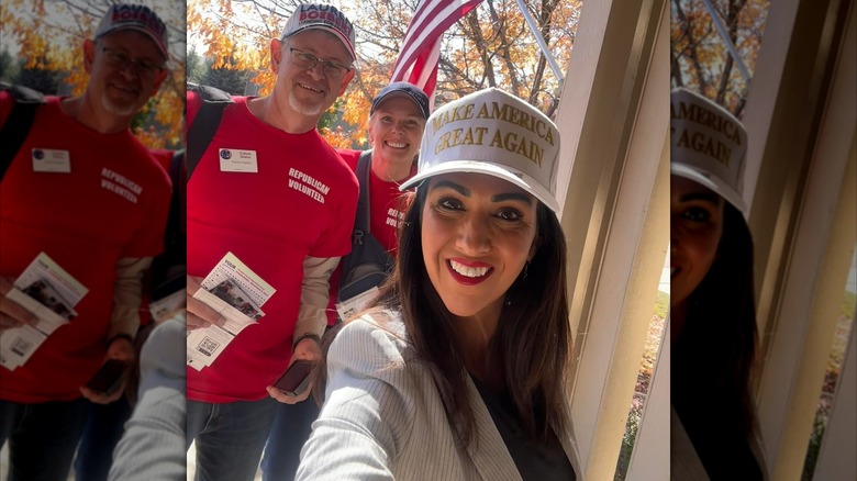 Lauren Boebert taking a selfie with campaign volunteers