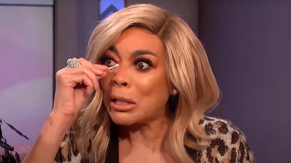 Wendy Williams wiping her tears with q-tips