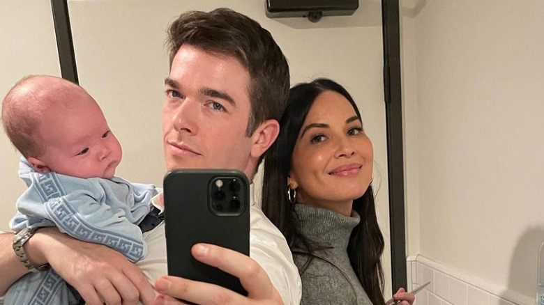 John Mulaney and Olivia Munn pose for a selfie with their son, Malcolm