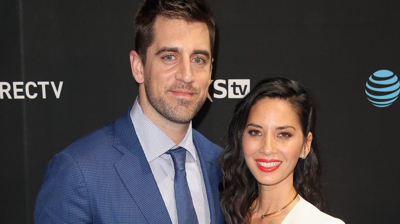 Aaron Rodgers and Olivia Munn pose at an event in 2016