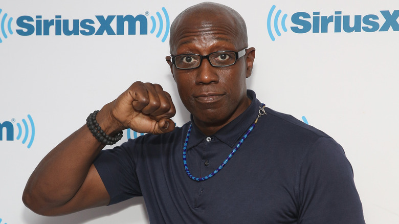 Wesley Snipes poses with his fist