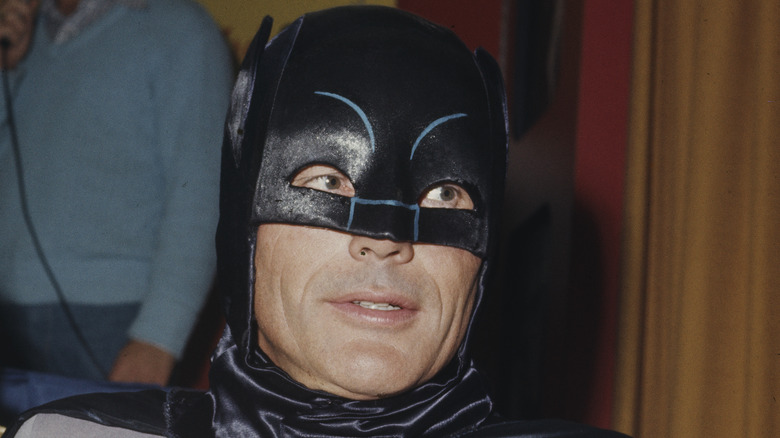 Adam West playing Batman