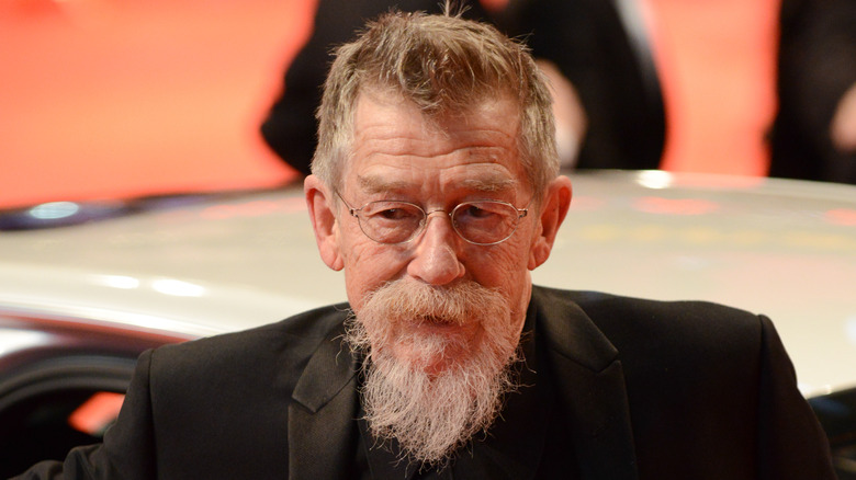 John Hurt walking