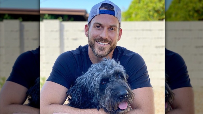 Chase McNary smiling in a backwards hat