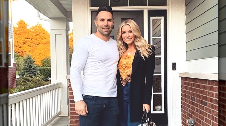 Mikey Tenerelli and his wife on their doorstep