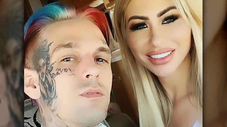 Aaron Carter and Melanie Martin posing for Instagram