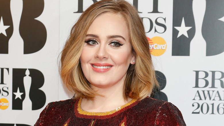 Adele posing at the BRIT Awards