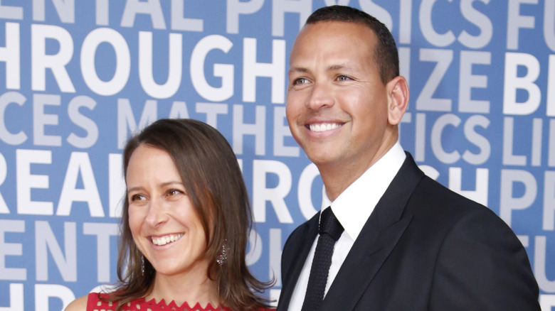 Alex Rodriguez smiling with Anne Wojcicki