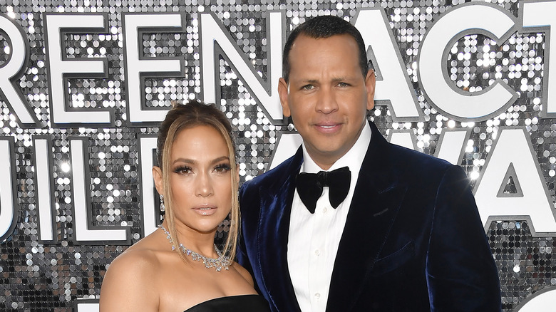 Alex Rodriguez posing with Jennifer Lopez