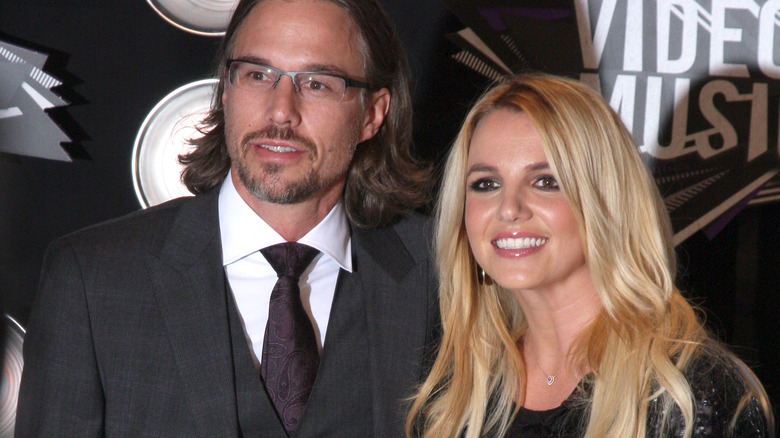 Jason Trawick posing with Britney Spears