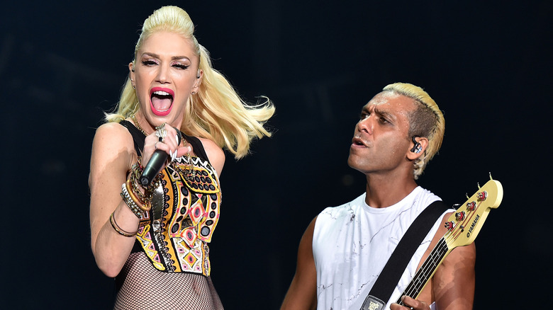 Gwen Stefani and Tony Kanal perform together