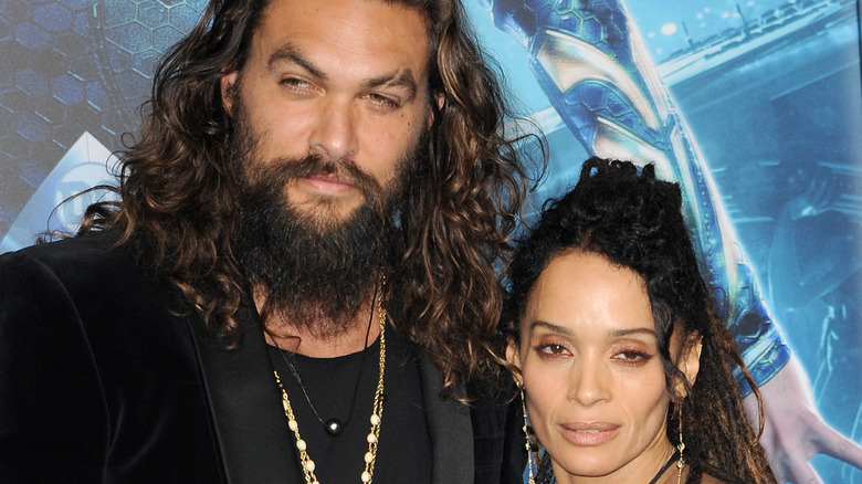 Jason Momoa and Lisa Bonet, posing