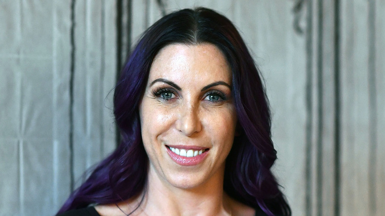 Alexis DeJoria posing for a photo