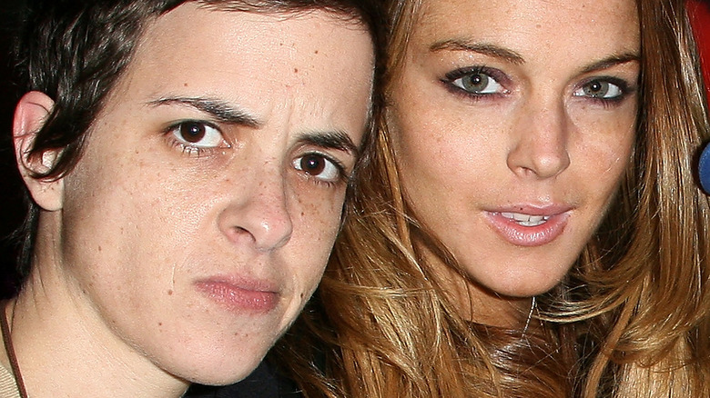 Samantha Ronson and Lindsay Lohan looking at camera