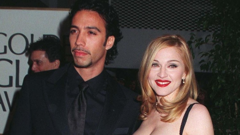 Madonna posing with Carlos