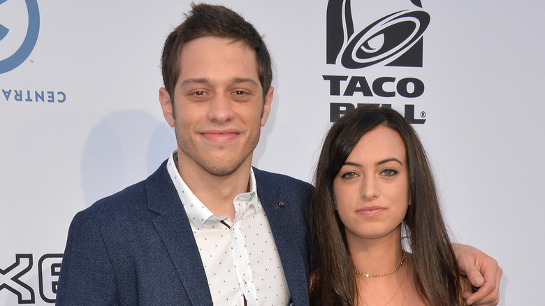 Pete Davidson and Cazzie David, posing