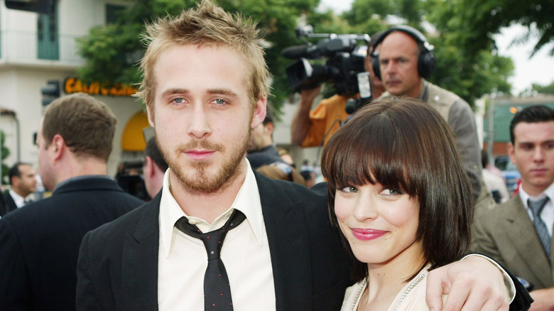 Ryan Gosling with hand on Rachel McAdams' shoulder