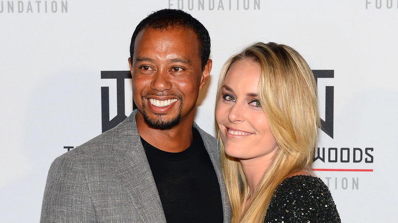 Lindsey Vonn, Tiger Woods smiling