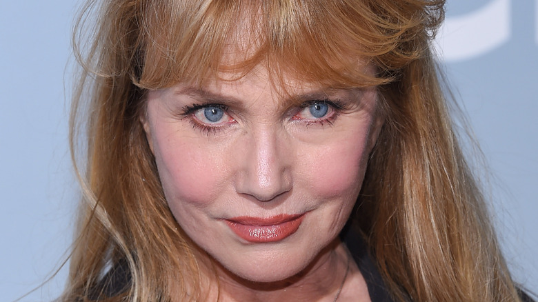 Rebecca De Mornay looking upward