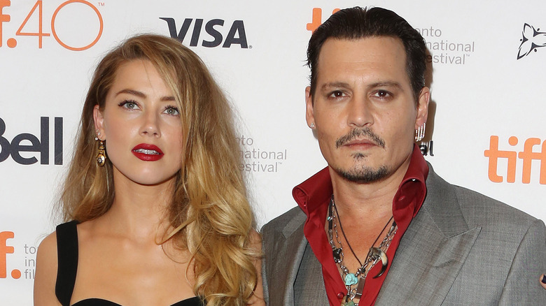 Amber Heard and Johnny Depp at the "Black Mass" premiere