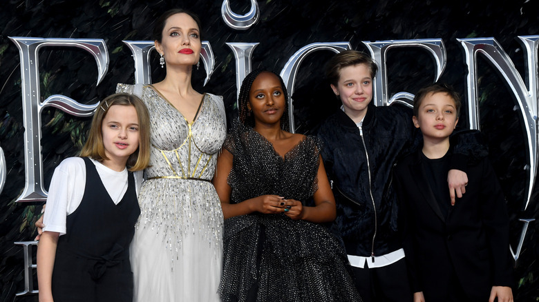 Angelina Jolie posing with her kids