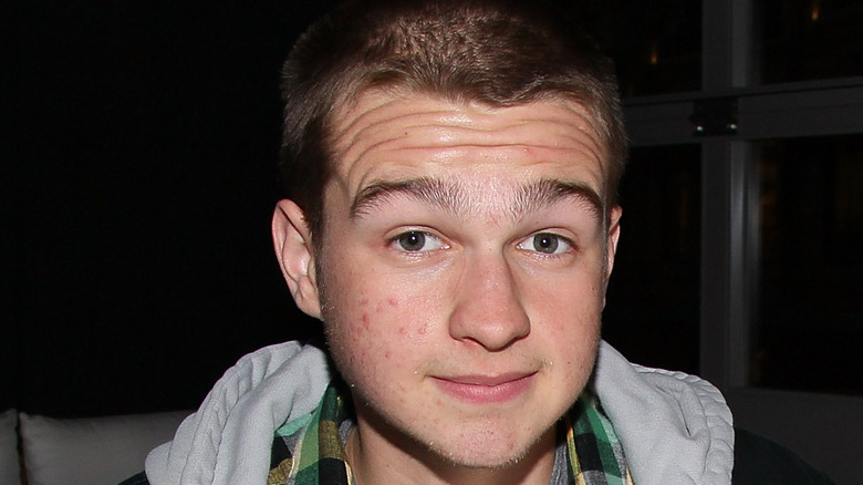 Angus T. Jones posing