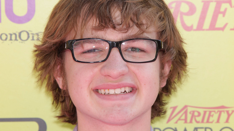 Angus T. Jones smiling